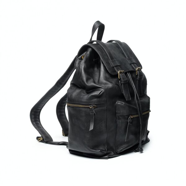 FieldCommander leather backpack with rugged military design, spacious compartments, and premium craftsmanship